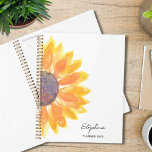 Sunflower Personalised 2024 Planner<br><div class="desc">This simple and stylish Planner is decorated with a yellow watercolor sunflower.
Easily customisable with your name,  and year.
Use the Customise Further option to change the text size,  style,  and colour.
Original Watercolor © Michele Davies.</div>