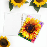 Sunflower Planner with Custom Name<br><div class="desc">Embrace the beauty of nature and stay organised with our Sunflower Planner, featuring a vibrant watercolor and ink painting of a large sunflower on its front and back covers. This delightful planner is a celebration of sunflowers and summer, perfect for gardening enthusiasts and nature lovers. Add a personal touch with...</div>