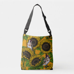 Sunflowers and goldfinches on orange crossbody bag