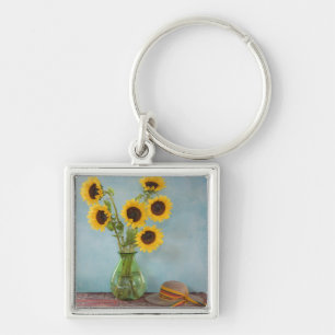 Sunflowers in vase on table key ring