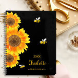 Sunflowers monogram cute bees black 2024 planner<br><div class="desc">A chic black background colour.  Decorated with large watercolored sunflowers and 3 cute,  happy smiling bees.  Personalise and add a name,  year and a title. The name is written in black with a large modern hand lettered style script. Perfect for school,  work or organising your personal/family life</div>