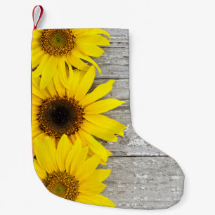 Sunflowers on a table small christmas stocking