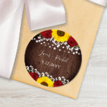 Sunflowers Red Roses String Lights Wedding Classic Round Sticker<br><div class="desc">This wedding sticker design features pretty painted red roses, baby's breath, sunflowers and string lights on a rustic dark wood background. Click the customise button for more flexibility in modifying the text. Variations of this design, different paper types, as well as coordinating products are available in our shop, zazzle.com/store/doodlelulu. Contact...</div>