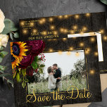 Sunflowers roses barn wood save the date wedding announcement postcard<br><div class="desc">Yellow gold sunflowers,  maroon roses,  and strings of twinkle lights on dark brown elegant barn wood photo save the date wedding postcard.           Easy to personalise with your names and text!            Suitable for floral summer or autumn fall / garden backyard rustic country or farmhouse themed weddings.</div>