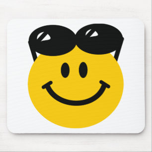 Sunglasses perched on top of head face mouse mat