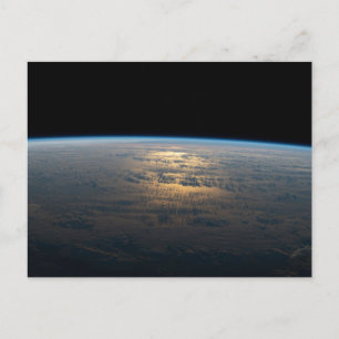 Sunglint Beams Off A Partly Cloudy South Pacific Postcard