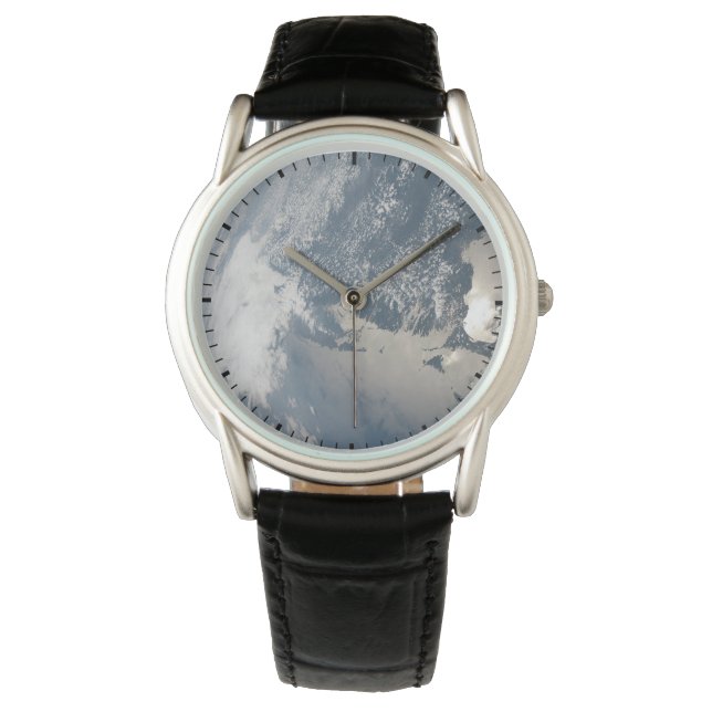 Sunglint On The Waters Of Earth. Watch (Front)