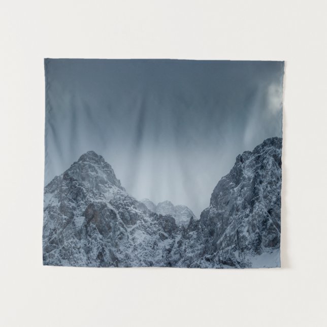 Sunlight and dark clouds over snowy mountains tapestry (Front (Horizontal))