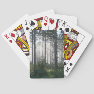 Sunlight Breaking Through a Misty Forest Playing Cards