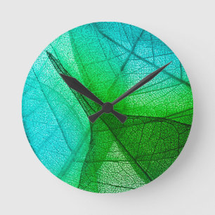 Sunlight Filtering Through Transparent Leaves Round Clock