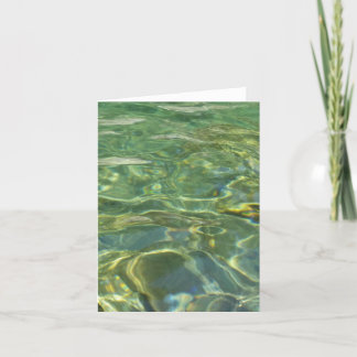 sunlit green swirling water greeting card