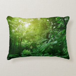 Sunlit tree canopy in tropical jungle decorative cushion