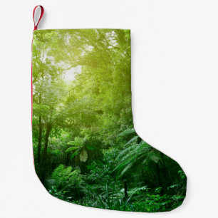 Sunlit tree canopy in tropical jungle small christmas stocking