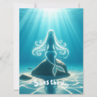 Sunlit, underwater mermaid