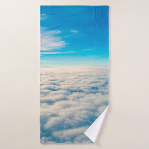 Sunrise above clouds from aeroplane window bath towel