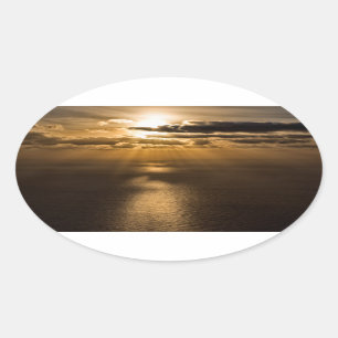 Sunrise above the Atlantic ocean Oval Sticker