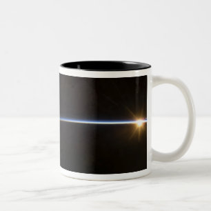 Sunrise as viewed in space Two-Tone coffee mug