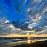 Sunrise at the Beach Mouse Mat<br><div class="desc">The Sunrise at the Beach Mouse Mat is the perfect addition to any desk, bringing the calming energy of the coast to your work or home office. This beautiful design captures the serene beauty of a morning sunrise on Ormond Beach, Florida, with its warm golden hues and peaceful ocean waves....</div>