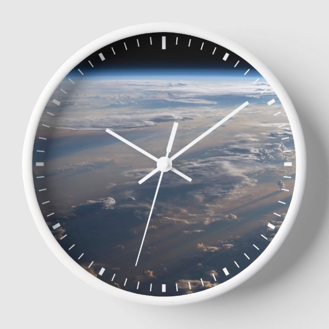 Sunrise Casts Long Shadows Over Philippine Sea Clock (Front)