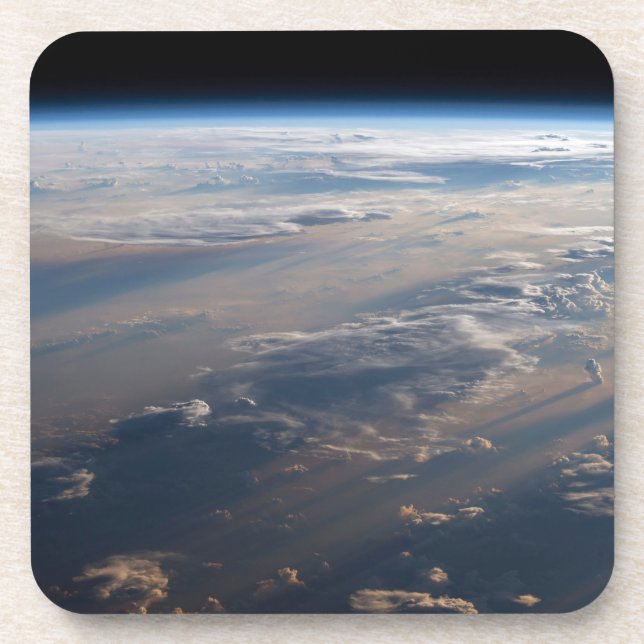 Sunrise Casts Long Shadows Over Philippine Sea Coaster (Front)