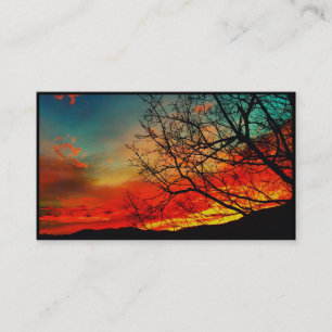 sunrise in mountains behind tree business card