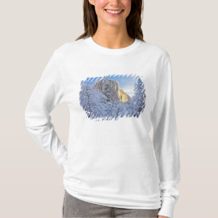 Sunrise light hits El Capitan through snowy T-Shirt