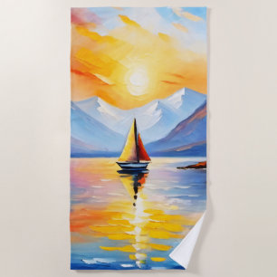 Sunrise over a lake and snow capped mountains beach towel