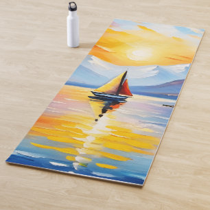 Sunrise over a lake and snow capped mountains yoga mat