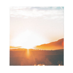 sunrise over a mountain notepad