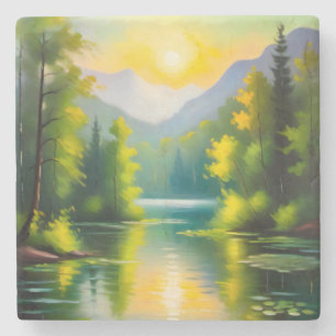 Sunrise over snow covered mountains and lake stone coaster