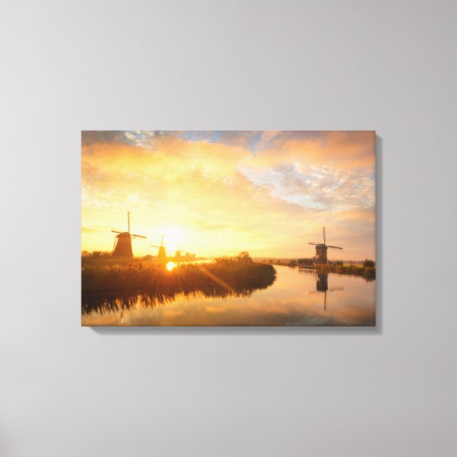 Sunrise over windmills and a river in Holland Canvas Print (Front)