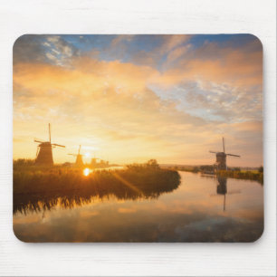 Sunrise over windmills and a river in Holland Mouse Mat
