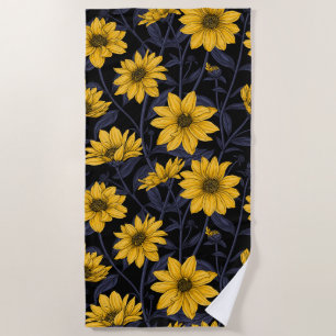 Sunroot, wild sunflower in yellow and blue beach towel
