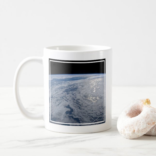Sun's Glint Beaming On The South Pacific Ocean. Coffee Mug (With Donut)