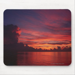 Sunset at sea with dark clouds mouse mat
