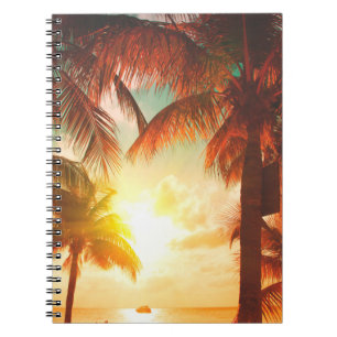 Sunset beach with palm trees and beautiful sky lan notebook