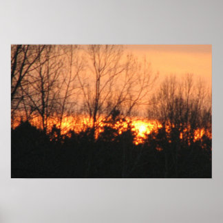 Sunset behind three poster