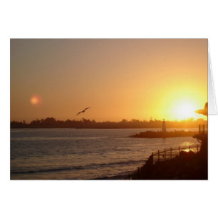Sunset by the lighthouse Postcard