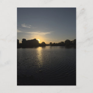 Sunset cityscape view in golden hours postcard