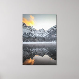 Sunset clouds over mountains at Lake Fusine, Italy Canvas Print