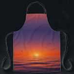 Sunset Horizon Apron<br><div class="desc">This apron features a serene sunset design with a gradient sky shifting from deep purple to glowing orange at the horizon. The sun casts a warm light over calm ocean waves, while birds soar gracefully across the sky, adding movement to the tranquil scene. Combining vivid colors with peaceful imagery, this...</div>