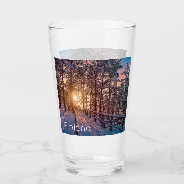 Sunset in snowy pine forest with sun ray glass (Front)