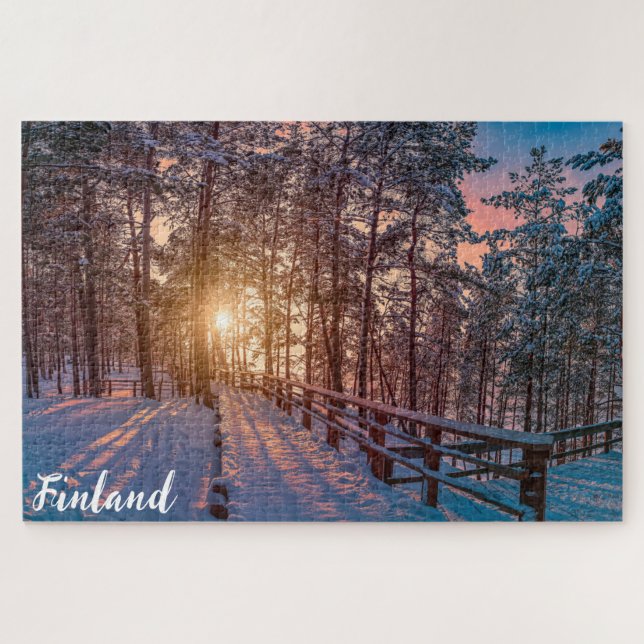 Sunset in snowy pine forest with sun ray jigsaw puzzle (Horizontal)