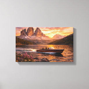 Sunset Lake with Classic Wooden Boat Canvas Print