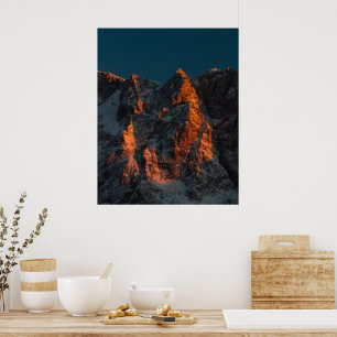 Sunset light on majestic mountains poster