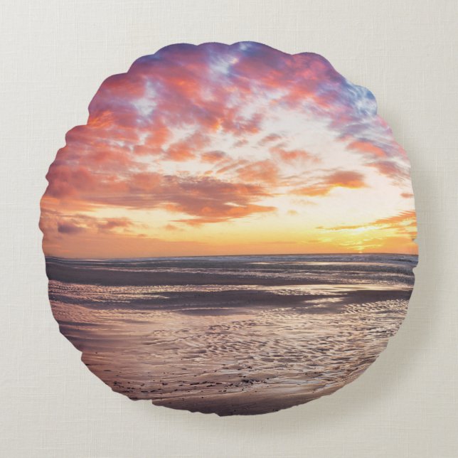 Sunset over beach and sea round cushion (Front)