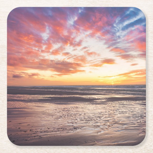 Sunset over beach and sea square paper coaster (Front)