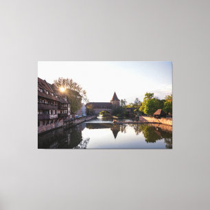 Sunset over old mediaeval bridge in Nuremberg Canvas Print