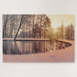Sunset over park with small frosty lake jigsaw puzzle