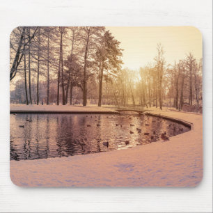 Sunset over park with small frosty lake mouse mat